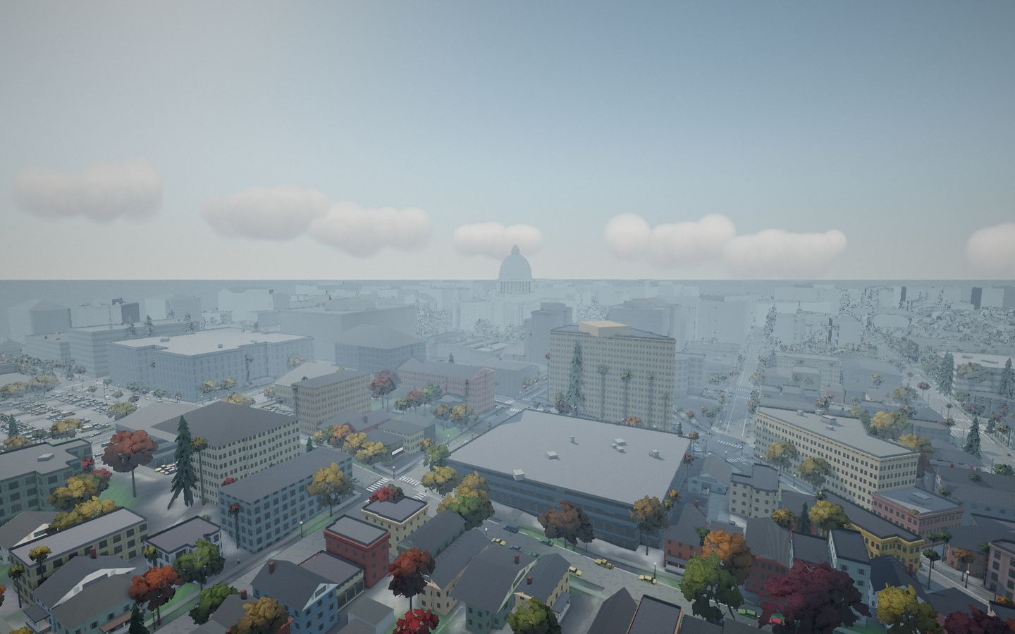 Downtown Madison from above, the Capitol dome on the horizon